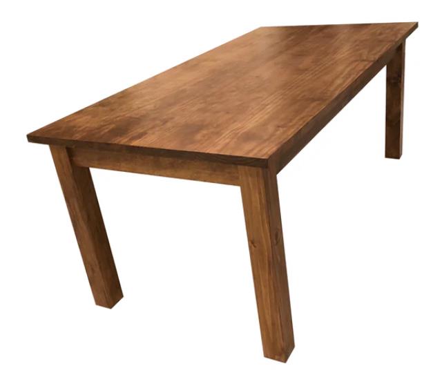 Solid wood rustic farm table with tapered legs, available to rent in Atlanta, Georgia