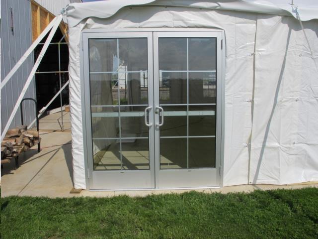 White aluminum-framed glass French double door wall panel for a frame tent, available to rent in Atlanta, Georgia